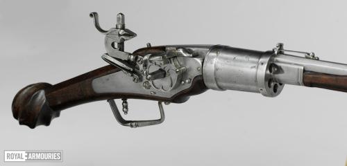 A Wheellock Pistol with a six-shot revolving cylinder, attributed to Paul Dubler,OaL: 27 in/68.5 cmB