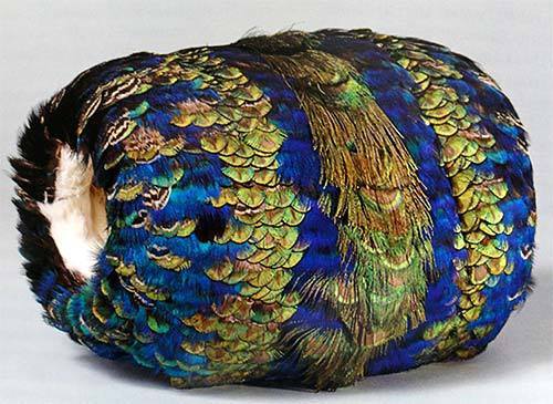 Muff, 1860 - 1870. Peacock Feathers, lined with White Ermine.