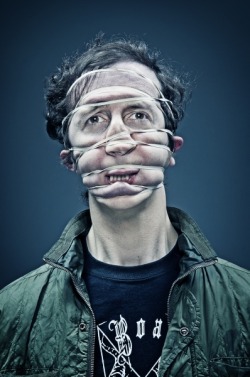 photojojo:  Wes Naman’s photos of faces distorted by scotch tape were huge on the internet. With tons of people asking what project he would come up with next, Wes decided to adapt his original series by using rubber bands instead of tape! Portraits