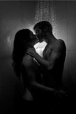 sinfulyearning:  Feeling the heat of the water flow over us as our own heat flares, draw to the surface of our flesh by a simple kiss.