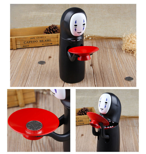 parks-and-rex: buyaesthetic: The Kaonashi No-Face Piggy Bank is a money box that automatically takes