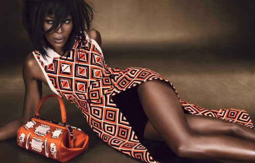 wmagazine:  Naomi Campbell is all legs in prints and pumps.  Photographed by Emma Summerton; styled by Giovanna Battaglia; W magazine July 2012. 