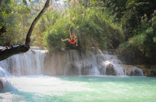 chimmyjin: One of my favorite spots in the world! Couldn’t stop swinging from that tree :DKuang Si w