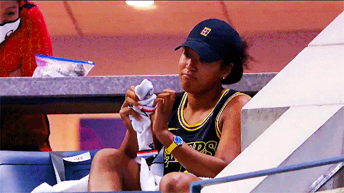 striveforgreatnessss: NAOMI OSAKA in the stands wearing a Kobe jersey after advancing to the US Open