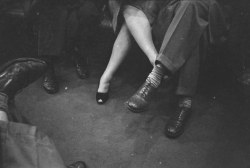 inritus:  Couple playing footsies on a subway, from Life and Love on the New York City Subway, 1946. Photographed by Stanley Kubrick. 