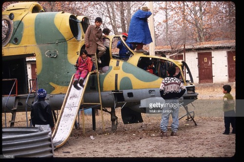 Ex-Afghan Mi-24 used as playground, Tajik side of the border, 1992. @history-related !