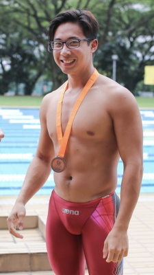 6sg:  sjiguy:Canoeist Joseph Goh in hot pink trunks won a medal for swimming Hot pink bulge.http://6sg.tumblr.com/archive
