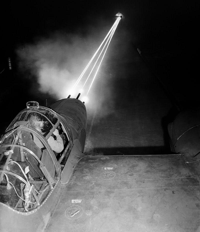 killthemallreanne:  historynet:  Nose guns of a P-38 Lightning aircraft lighting
