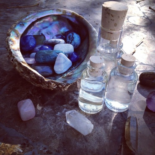 ghostsiren:Moon water and charged crystals. 🔮🌙⭐️✨ 