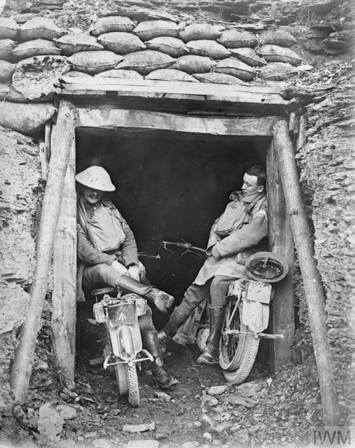 meninroad:© IWM (Q 26304) Despatch riders resting against the entrance to a dug-out somewhere on the