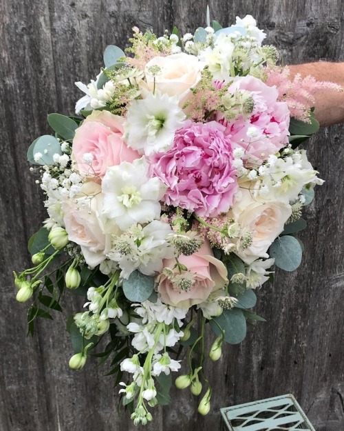 Yesterday’s totally stunning bridal bouquet #peonies#weddingflowers #gardenroses #delphinium #pastel