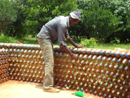 mylittlerewolution:  Did you know that you can make houses out of plastic bottles? By filling them with sand, and molding them together with mud or cement, the walls created are actually bullet proof, fire proof, and will maintain an comfortable indoor