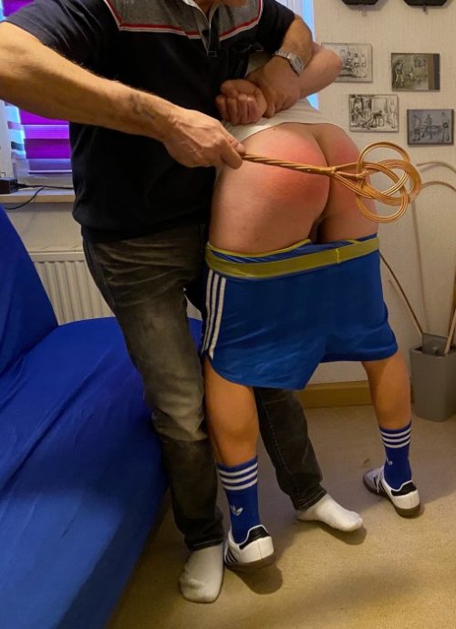 pantsdownspanker:Some dad/son domestic scenes.   This is so realistic.  Dad grabs the carpet beater 