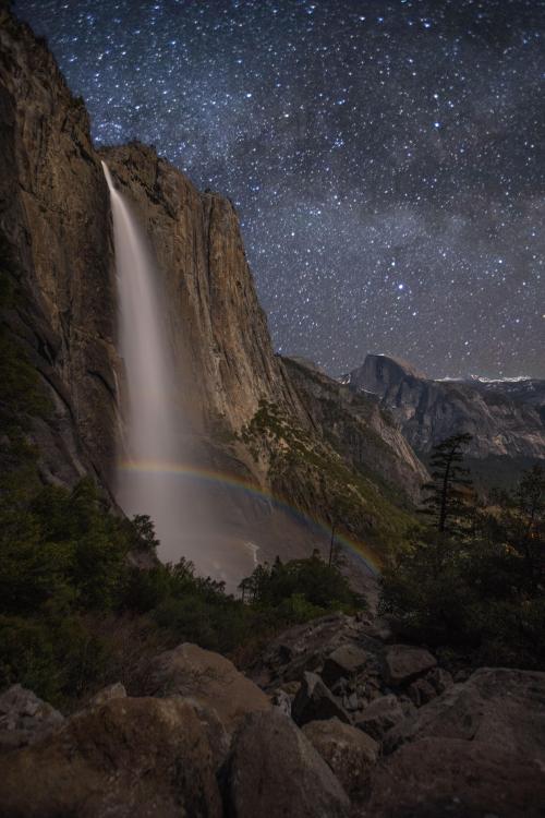 amazinglybeautifulphotography:  I’ve waited a few years for the stars, moon, and weather conditions to align for this shot. On Thursday the day finally arrived. Upper Yosemite Fall w/ Moonbow and Half Dome underneath the Milky Way. [OC][5456x8179] -