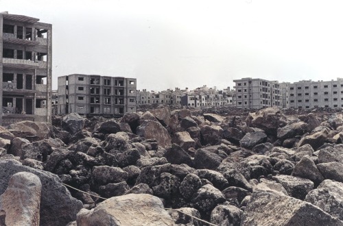 rudygodinez: Sophie Ristelhueber, Two Images from the series “Dead Set”, (2001) In Dead Set, Ristelhueber uncovers a vast system of deserted public housing in Syria. This series shows life arrested, unfinished, as modern construction taken over by