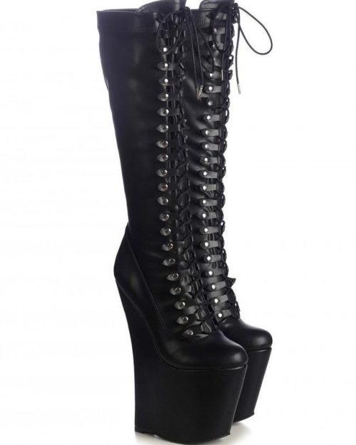 Stomp out of the graveyard and onto the dancefloor in these 8-inch narrow-platformed lace-up knee hi