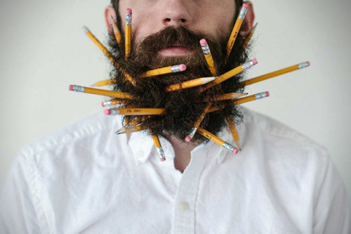 brain-food:  Photographer Stacy Thiot’s Tumblr project, Will It Beard, involves her husband’s beard and sticking as many unusual things as she can find in the thick thicket of facial hair—and then taking photographs of it. 