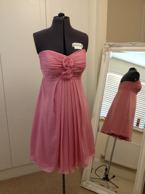 Transformation of a cherished bridesmaids dress into a cute sun dress! We altered the size of the go