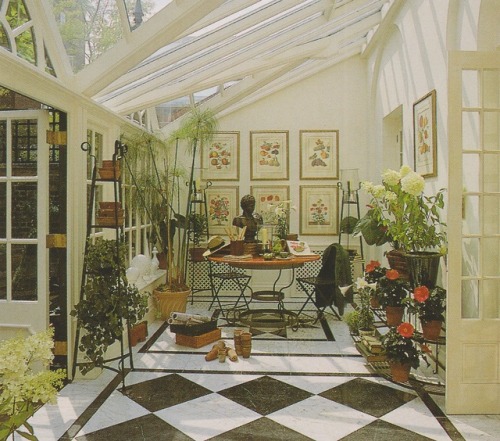 vintagehomecollection:An elegant garden room appropriately furnished with metal folding chairs, pain