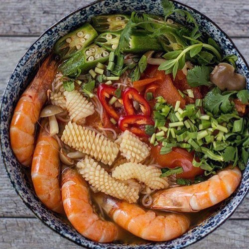 Dinner’s ready! Vermicelli, shrimp, squid, tomatoes, mushrooms, okra, Tom Yum soup base, saw-t