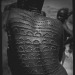 sighsandrolledeyes:Scarification on a woman from the Nuba tribe of Sudan 
