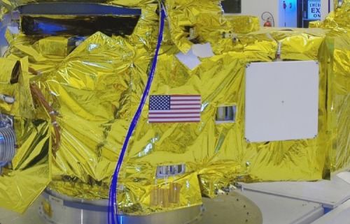 2015 July 4New Horizons Stars and StripesExplanation: The New Horizons spacecraft is adorned with tw