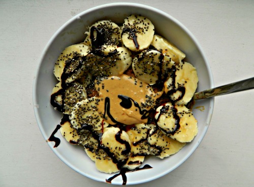 Cocoa oatmeal cooked in oat mylk, topped with bananas, cashew butter, chia seeds and a drizzle of&nb