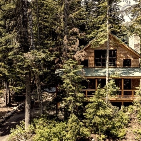 Wood ExteriorMid-sized Mountain Style Two-story Wood And Shingle Exterior Home Photo With A Metal Roof