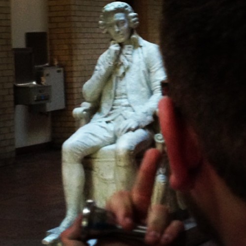 Mozart was mean mugging me so I gave him the finger.