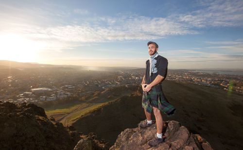 Mon Ami A Frenchman wearing a kilt at the top of Arthur’s Seat Edinburgh