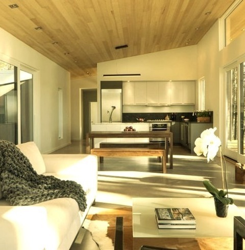 Open New YorkLiving Room - Mid-sized Modern Open Concept Concrete Floor Living Room Idea With White Walls,