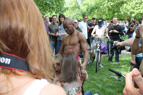 nudisterections:  This guy always gets a crowd a the World Naked Bike Ride! I just wonder why!   perfect settings
