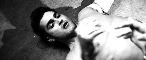 youneedmetosurvive:Stiles holding hands with Derek, caressing his face and touching his bare back