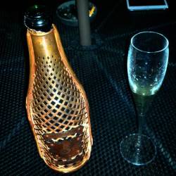 Super classy copper clad champagne bottle