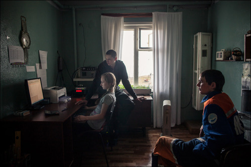 The crew of meteorological station Sannikova: Sasha, Sveta, Sasha. Kotelniy Island, Yakutia, Russia.