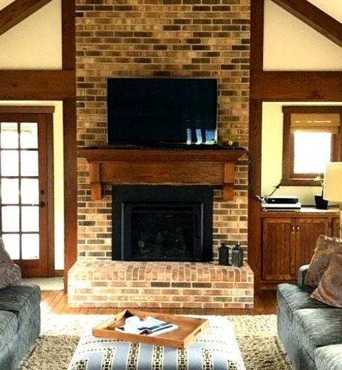 Chicago Home BarLarge Transitional Enclosed Medium Tone Wood Floor, Brown Floor And Exposed Beam Family