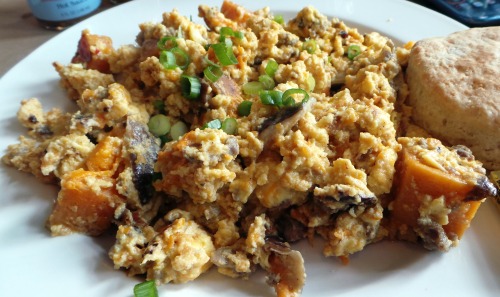 Local Sausage and Sweet Potato Scramble Eggs scrambled with local pork sausage, shiitake mushrooms, 