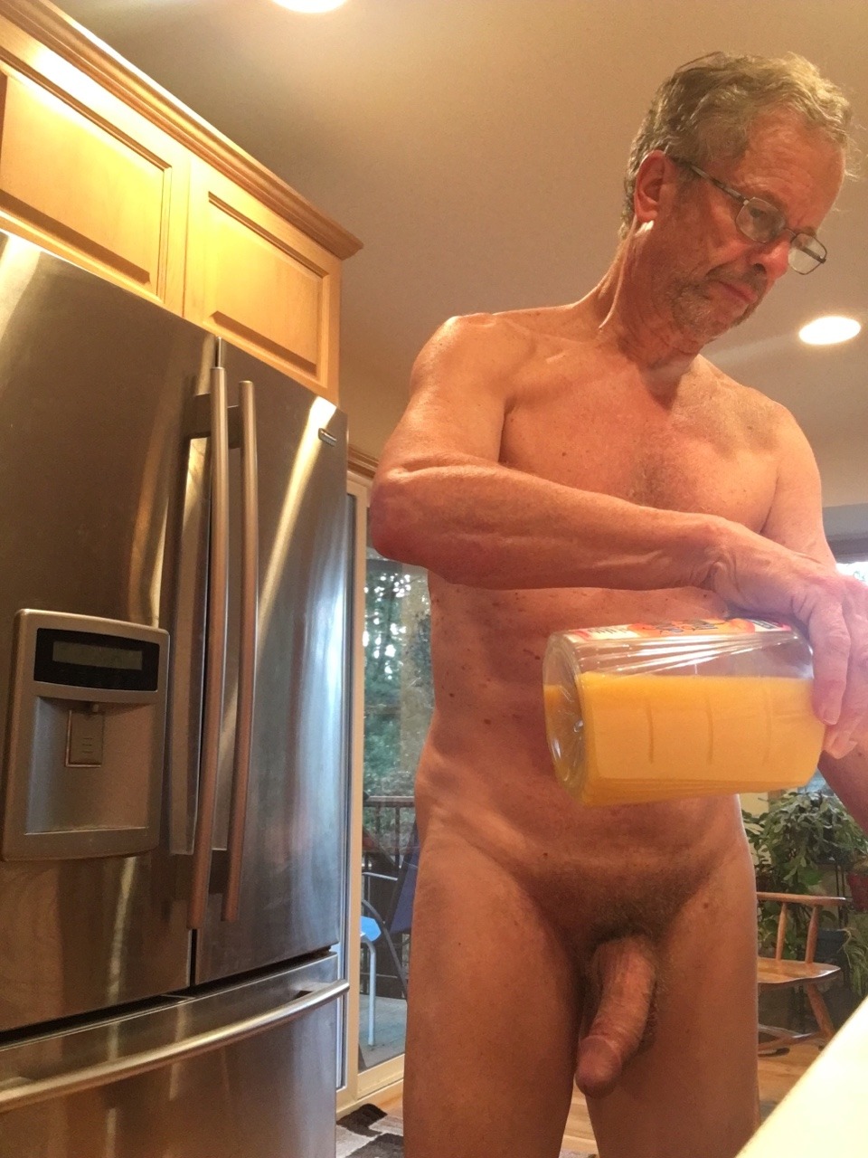 pnw007:  LIVING EVERYDAY NUDISM:   Good morning.  Pouring  my orange juice as another