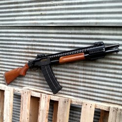 gunrunnerhell:  Black Aces Tactical Pro Series Classic TacPro A mix of old school pump-action 12 gauge and wood, but with a bit of modern tactical due to the rail and magazine. There are the obvious pros and cons with the design. Having a large magazine