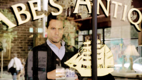 daughteroctober:#Henry stands in the shop window  #staring at the boat and wondering what life 