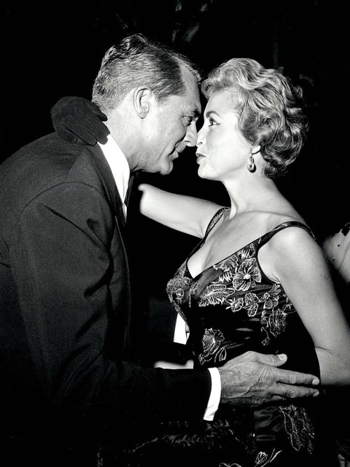 archiesleach:  Cary Grant and Janet Leigh greet each other at an unspecified event, c. late 1950s.