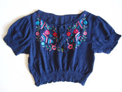 muchacha-mala:  apoyando:  booknerdbiscotti:  oh-beatriz:  ebay:  Go Latina this Summer, with beautiful Peasant Top by Anthropologie   go Latina this summer???peasant top????  “Latina” is referring to the color and embroidery of the top, which is