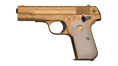 Engraved, gold plated, sapphire studded Colt Model 1903 with ivory grips. Shipped to Richards & 