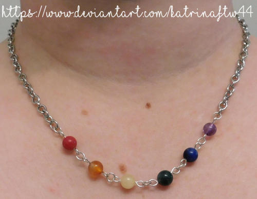 I made this using crystal beads (coral, carnelian, honey calcite, moss agate, sodalite, and amethyst