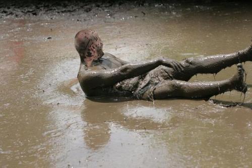 Mud volleyball player down