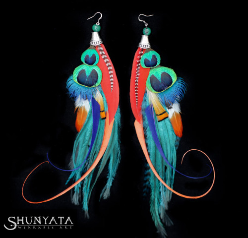 Hand sculpted, cruelty free feather earrings.