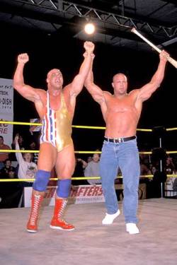 Rwfan11:  Kurt Angle (W/ His Brother, I Believe)