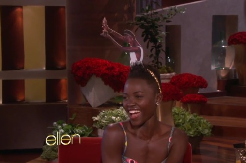 idlethumbsidleminds:  notkatniss:  Lupita Nyong’o is wearing a headband of a photo of her winning the Oscar  How can you not adore this lovely goddess? 