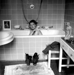 historicaltimes:  American war correspondent Lee Miller takes a bath in Hitler’s Munich apartment hours after his suicide, tracking mud fresh from Dachau across the floor. 30 April 1945 via reddit 