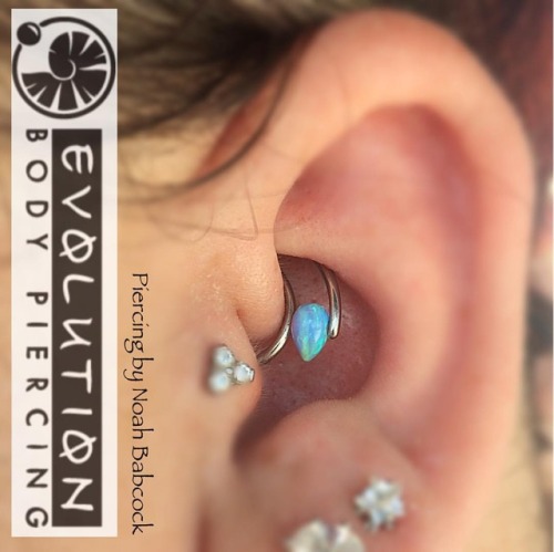 Fresh #daith piercing with jewelry by #evolvejewelry and #evolutionmetalworks with a bit of custom b